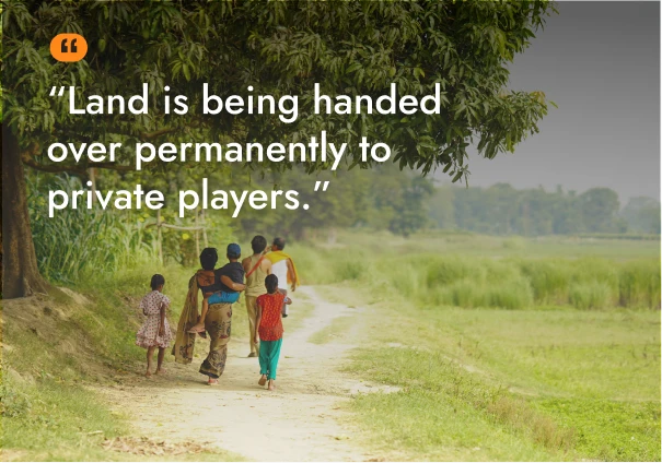 People walking on a rural path with text about land being handed over to private players.